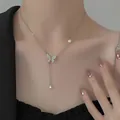 Silver butterfly pendant necklace with zircon paving, long tassels and pearl detail - Silver Tassel Pearl Style (2044)