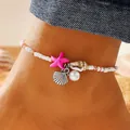 Tobillera bohemia con estrella de mar rosa, conchas plateadas y cuentas blancas de verano - Estrella de Mar Rosa