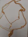 Gold layered necklace featuring a crucifix cross and a virgin mary medal pendant charm - Double Layer Cross Virgin Mary Gold Style
