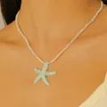Collana boho con perline e ciondolo a stella marina blu menta scintillante - K Bianco A-944