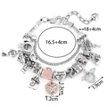 Silbernes Charm-Armband mit rosa Emaille-Herz und Enkelin Reiseanhängern - Rosa Koffer Einkaufstasche Stil (FX990)