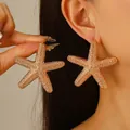 Statement oversized gold starfish earrings with textured dot details for beach vacation - Textured Starfish Stud (5600) / Gold