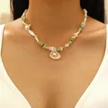 Collana bohémien con perline, ciondolo a conchiglia e pietra turchese vintage - Oro KC 5686