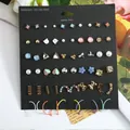 Set di 30 paia di orecchini alla moda con perle, farfalle e cuori su scheda espositiva - Perla Farfalla Cerchio