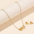 Nahaufnahme von goldenem Herz- und Unendlichkeitssymbol Halsketten- und Ohrringset - Herz Unendlichkeitssymbol (FX37) / Gold