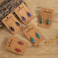 Bohemian retro alloy earrings set with turquoise inlay in various colors on wood background - Red Trapezoid Shape