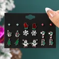 9-pair set of festive Christmas stud earrings featuring snowman and tree on display card - 9 Pairs/Set Glove Snowman Snowflake