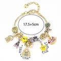 Bracelet chaîne serpent dorée avec des breloques féeriques comme château et chaussons - Style Château De Conte De Fées Cheval À Bascule Or (FX1001)
