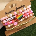 Vijfdelige roze kralenarmbandset met regenboog hart hanger en LOVE letter kralen - Regenboog Hart LOVE Stijl (HS1586-4)