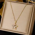 Gold star pendant necklace with colorful zircons on a champagne jewelry display box - Star (XL1494-25)