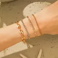 Set of four gold-plated bracelets featuring Figaro and twist chains with rhinestones - Coffee Bean Tennis Rectangle Combination (1918) / Gold