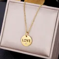 Elegant gold round LOVE pendant necklace with zircon on a luxury velvet jewelry box - LOVE