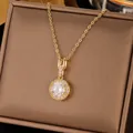 Golden geometric pendant necklace with sparkling crystal inlay on a display box - Full Zirconia Round Pendant