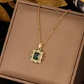 Emerald crystal pendant necklace in 18k gold plated steel with zircon micro-paving - Vintage Artificial Emerald Style