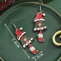 Festive Christmas drop earrings featuring Santa hat, sweater, and stocking motifs in wood - Triple Printed Drop (SD61371)