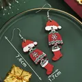 Christmas earrings with Santa hat, sweater and sock charms, measuring 7.6cm by 1.7cm - Red Hat Sweater Sock (SD61330)