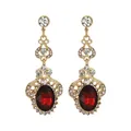 Detail of luxury gold drop earrings with oval red gems and intricate vintage filigree - Gold Palace Retro Red Gemstone Style (L10301-Red)