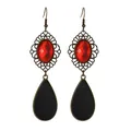 Detailed close-up of retro water drop earrings with red gemstone and black fringe - Bronze Hollow Red Gemstone Black Drop Style (L10307-Red)