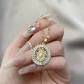 Vintage Jungfrau Maria Halskette mit bunten Zirkonia und goldener Wasserwellenkette - Gold