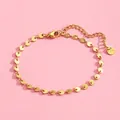 Detailed macro view of gold stainless steel disk chain bracelet with lobster clasp and tag - Gold Disc Chain Style (SL60025-Gold) / Gold