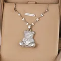 Collana con ciondolo a orsetto scintillante in oro 18K con dettaglio quadrifoglio - Catena a Foglia Argento Ciondolo Orsetto-Pietra Bianca / Argento-Bianco