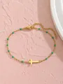 Bracelet de cheville en acier doré avec perles vertes et pendentif croix sur fond rose - Style Croix Horizontale / Vert (Style 2)