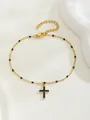 Dettaglio del bracciale a croce placcato oro con perline nere e chiusura a moschettone - Stile Pendente Verticale / Nero (Stile 1)