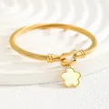 18K gold plated stainless steel cable cuff bracelet with a floral shell pendant - Flower