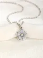 Close-up of a silver flower pendant necklace with gray petals and a sparkling AB crystal center - Flower - Gray