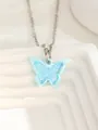 Macro shot of a light blue translucent resin butterfly pendant with a silver metal chain - Butterfly 2 - Blue
