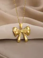 Polished gold bow pendant necklace on a champagne satin background for women - Bowknot Style 2
