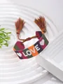 Colorful woven friendship bracelet with white LOVE lettering and vibrant tassels - Multicolor LOVE Style