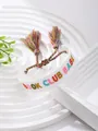 White woven bracelet with colorful BOOK CLUB BABE embroidery and stylish tassels - White BOOK CLUB Style