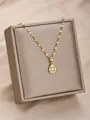 Lujoso collar de gota dorado con motivo de ojo y circón en caja de regalo beige - Mal de Ojo en Forma de Lágrima (3)