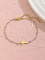 Bracelet doré en acier inoxydable avec des perles mauves et un pendentif de croix - Style Croix Horizontale / Violet (Style 2)