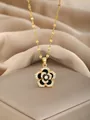 Detailed close-up of a floral pendant necklace with black enamel and white zircons - Gold Black White Enamel Flower Style(29)