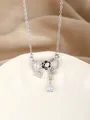 Macro detail of silver bow pendant with zircon, white pearl, and pear-cut crystal - Silver Bowknot Black White Petal Style(21)