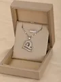 Silver-tone heart pendant necklace with micro-pave cubic zirconia in a gold jewelry box - Heart-Silver