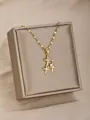 Elegante collar dorado con tres colgantes de estrellas brillantes en un estuche - Triple Estrellas Escalonadas (11)