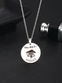 Macro view of silver graduation pendant with You did it and Graduate engraving - Round You did it Engraved Style (67-Silver) / Silver