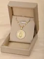 Golden round Virgin Mary pendant necklace with white rhinestones in a velvet jewelry box - Round Virgin Mary