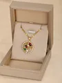 Gold Virgin Mary necklace with colorful floral gemstones and pearl in a brown gift box - Sunflower