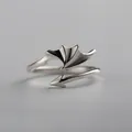 Adjustable silver demon wing ring with an asymmetric open design and arrow tail detail - Silver