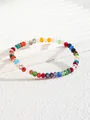 Pulsera de cuentas arcoíris con cristales facetados de colores en superficie rugosa - Cuentas facetadas de colores (6 colores)