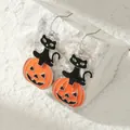 Detail of Halloween cat and pumpkin earrings with vibrant orange and black enamel finish - Black Cat Pumpkin Lantern Style (H-51) / Colorful