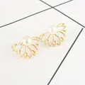Elegant hollow lotus stud earrings in gold finish with creamy white pearls - Pearl Hollow Lotus Stud (9559) / Pearl Gold