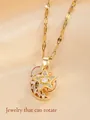 Rotating star and moon pendant necklace in gold finish with sparkling cubic zirconia - Rotating Star Moon Style (W93-PJ93092-GD)
