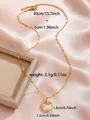 Gold star and moon pendant necklace with zircons on pink satin background - Star Moon Nested Zirconia Pendant (W93-PJ93071-GD)