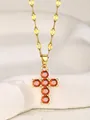 Collar de cruz dorada con gemas de circón naranja rojizo y cadena de eslabones - Rojo