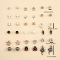 Detailopname van vlinder-, ster- en pareloorknoppen set in gemengde metaalbeplating - Multi-element Trendy Oorbellen Set (FX050937)